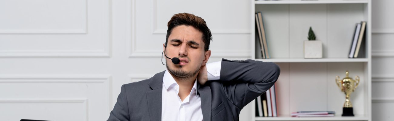 Physiotherapist realigning male patient’s spine at EEZALIGN Gurgaon